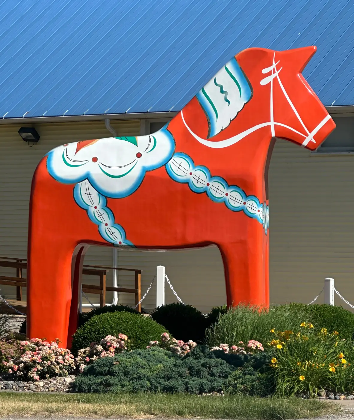 Ole, the museum's 14-foot red Dala horse, standing on James Avenue in Swedesburg.